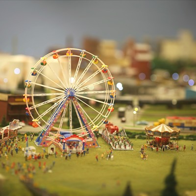 A fair within a fair. The Ferris Wheel of a model train exhibit operated by the Central Iowa Model Train Club at the Iowa State Fair. Picture taken by Keith Collins on August 13, 2019 in Des Moines, Iowa at the fairgrounds.