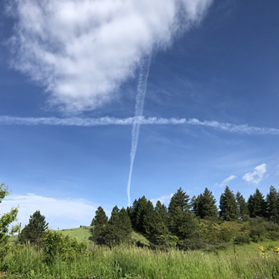 It's our anniversary and even the contrails know where we are. A morning coffee break on the patio has a special mark for our special day plus 54 years.
    Taken June 11, 2020 over our home near Wallen Road, Moscow by Karen and David Purtee.