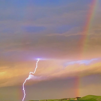 Rainbow during a lightning storm