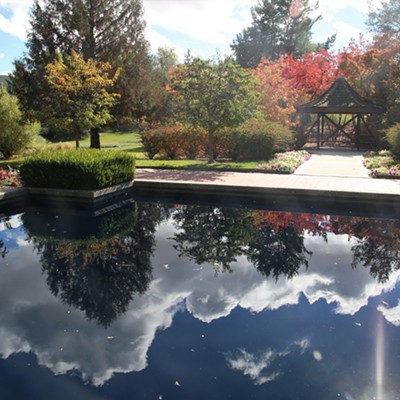 Inverted cumulus clouds reflected in a pool at Lawson Gardens on a brilliant day in Pullman, Washington.  Photo taken September 29, 2021 by Keith Collins.