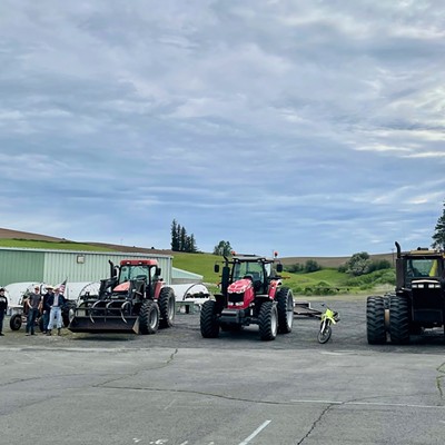 Celebrating the last day of school by driving tractors, jeeps and motorbikes to school at Potlatch High.
