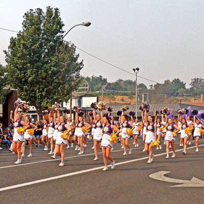 This photo of Lewiston High School's cheerleaders and marching band was taken during the annual rodeo parade in downtown Lewiston on September 10, 2022 by Leif Hoffmann (Clarkston, WA).