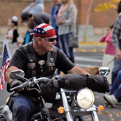 A patriotic motorcyclist in the Veterans Day Parade Nov. 12, 2016. Photo by Richard Hayward of Clarkston.