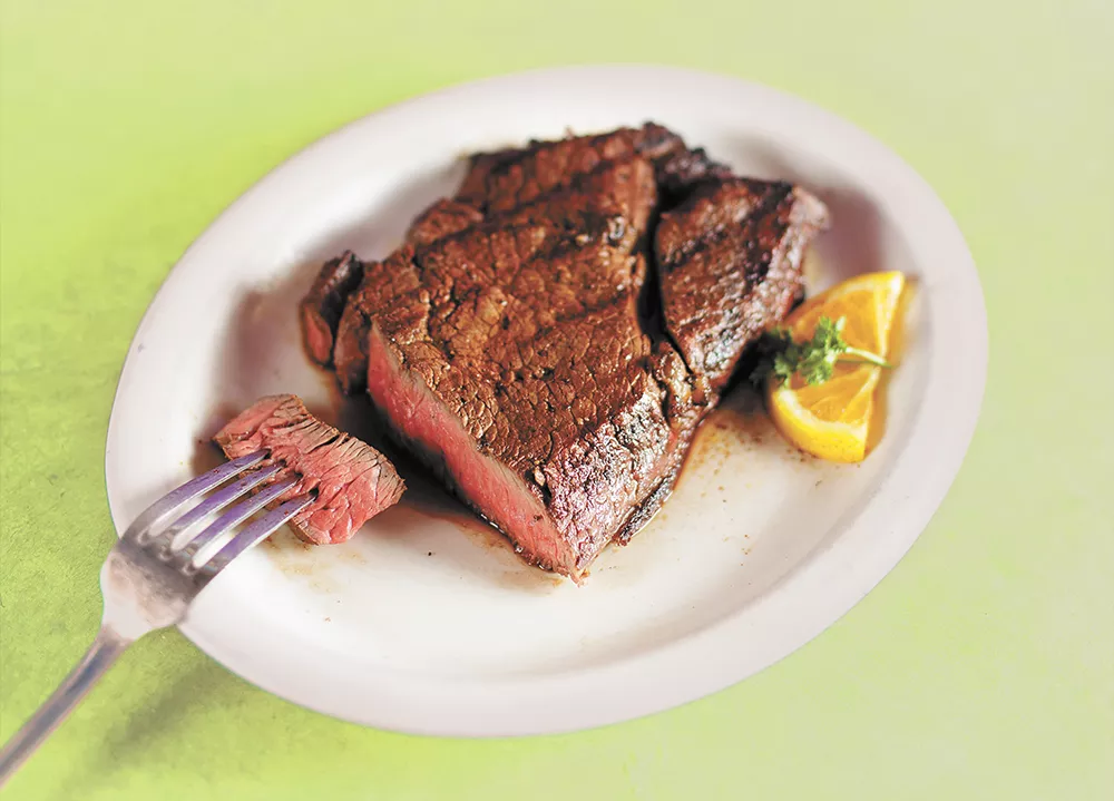 A 26 oz. cowgirl top sirloin steak from the Wolf Lodge Steakhouse located just outside of Coeur d’Alene. - YOUNG KWAK