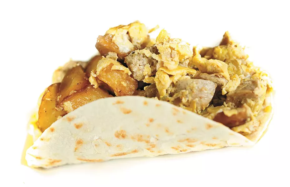 A chicken apple sausage burrito from 9th Street Bistro - YOUNG KWAK