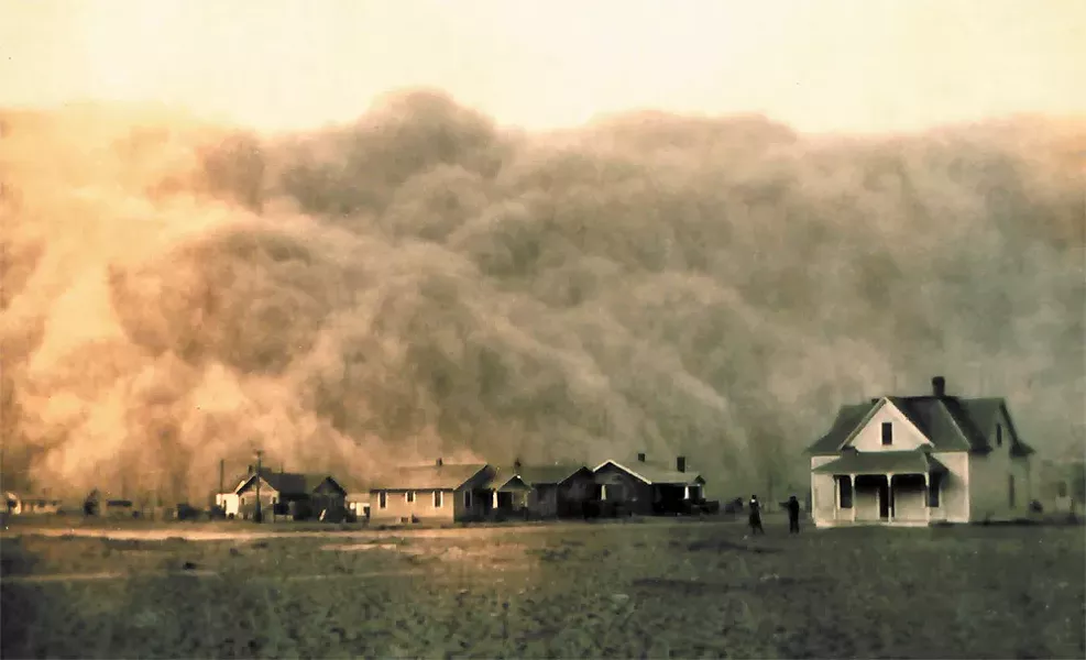 A dust storm approaching Stratford, Texas, in 1935 — the height of the Dust Bowl. - GEORGE F. MARSH