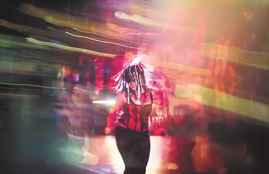An Elektro Grave concertgoer dances hard at last month's show. - KRISTEN BLACK
