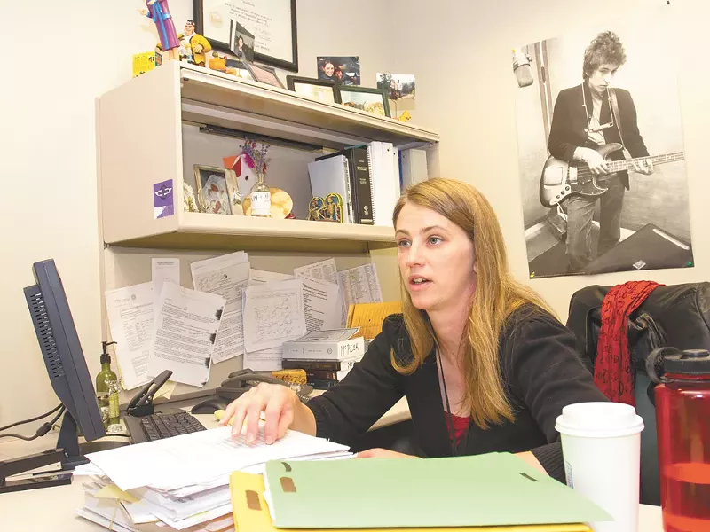 Assistant Public Defender Alison McPeek and a few of her many cases. - JEFF FERGUSON