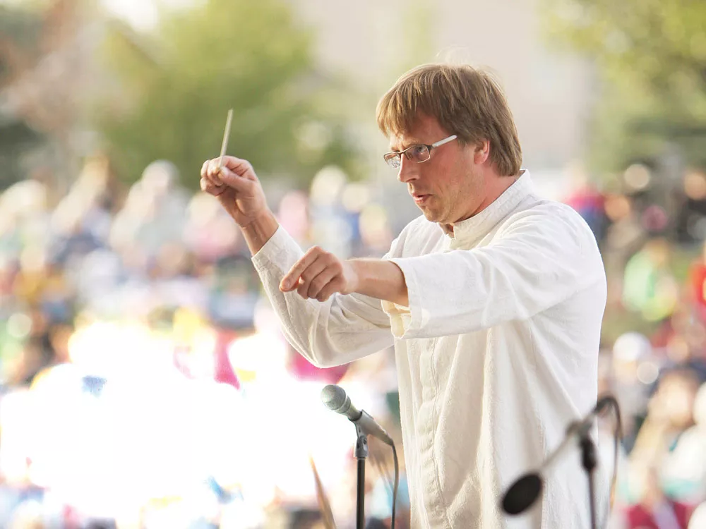 At Liberty Lake's Pavilion Park, Eckart Preu conducts the SSO's only free outdoor concert this season. - YOUNG KWAK PHOTO