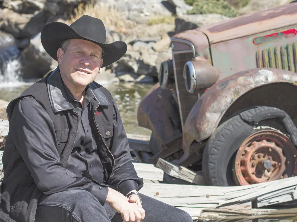 Author Stephen Smart in front of the 1937 International truck that appears in his novel. - JEFF FERGUSON