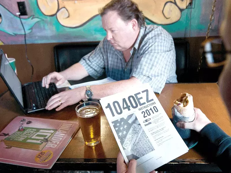 Beer, burrito and tax preparation by Dan Johnson. - AMY HUNTER
