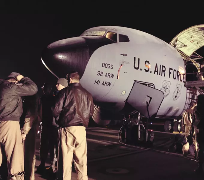 Before reaching Manas, the plane stopped over at a base in England. - YOUNG KWAK