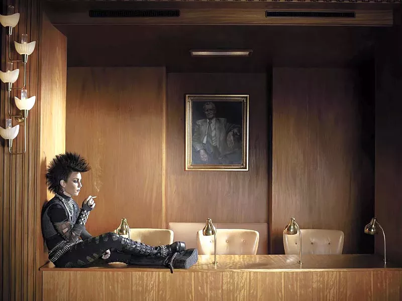 Boardroom punk (he's the one on the wall)