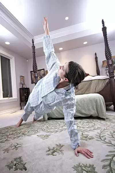 Britanne Bergevin starts her day with the T Push-up. - YOUNG KWAK