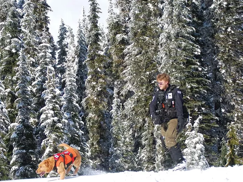 Bud Marks and Chester sniff out clues - CENTER FOR CONSERVATION BIOLOGY