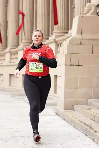 Cancer survivor Carol Dellinger has run three marathons this year. - YOUNG KWAK