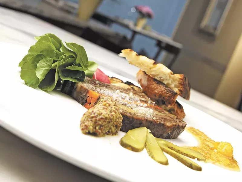 Celebratre 20 years of Luna with a bite of their oxtail terrine. - YOUNG KWAK