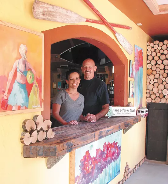 Chris and Jane Hammons at Embers by the Lake. - CARRIE SCOZZARO