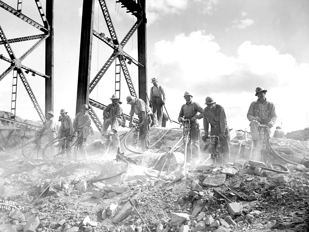 Construction of the Grand Coulee Dam took eight years and claimed 77 lives. - CHARLES LIBBY PHOTO/NORTHWEST MUSEUM OF ARTS