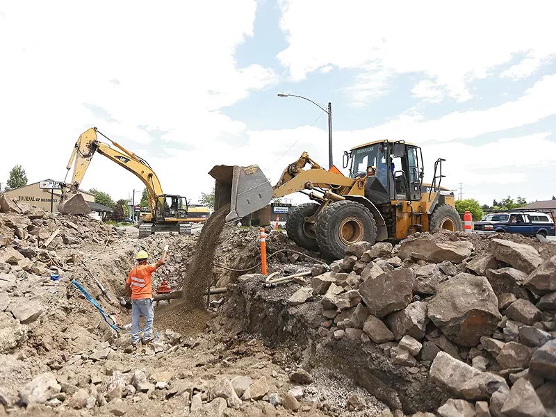 Crews are currently replacing a water main below Third Avenue near Division Street. - YOUNG KWAK