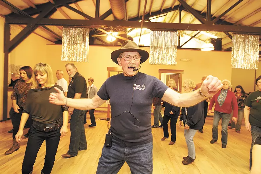 Crossroads' owner Bob Crossman (center) lost his dance partner in May. - YOUNG KWAK