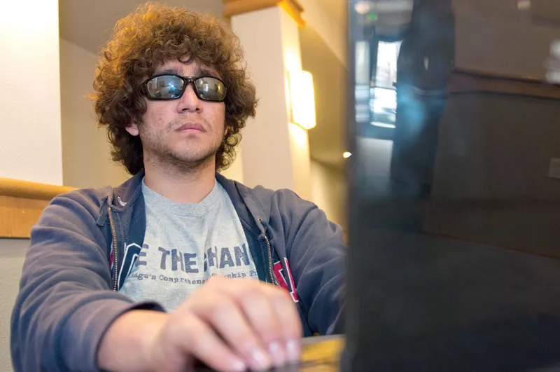 Dealing with loss of sight and a new home, Gonzaga student Gabriel Castellanos is giving his memory a workout — "because I can't write stuff down." - AMY HUNTER