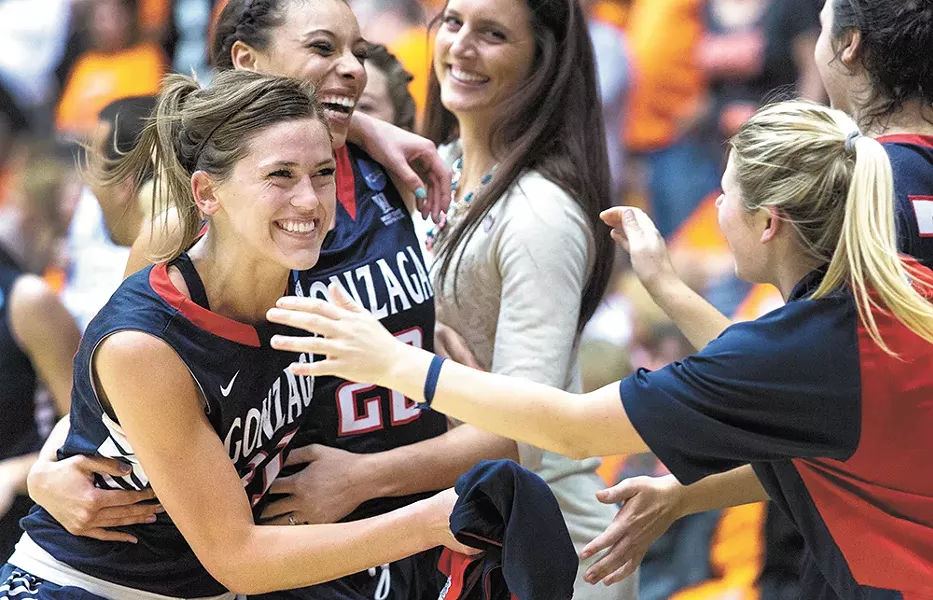 Elle Tinkle (left) and Shaniqua Nilles hug after upsetting Oregon State. - ELI FRANCOVICH