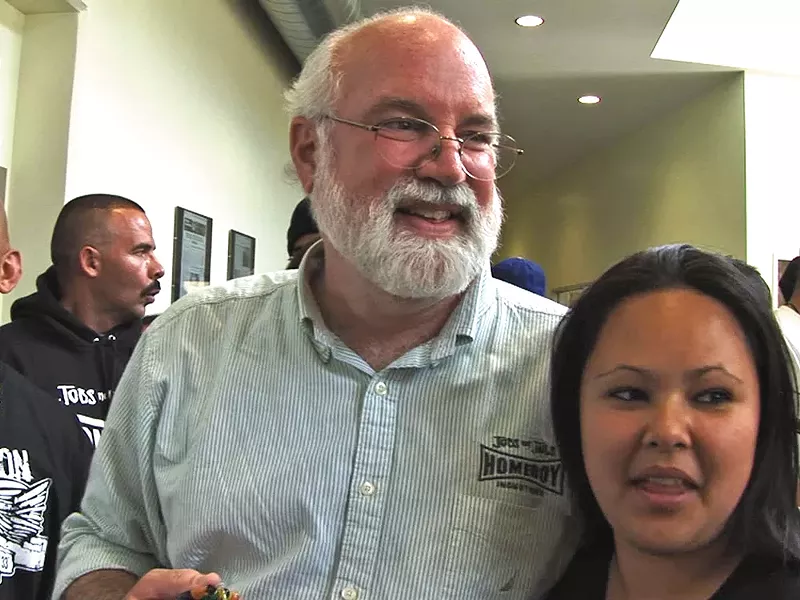 Fr. Greg Boyle along with his Homeboy Industries employees.