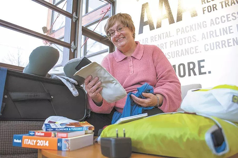 Frequent traveler Stephanie Leek considers a purchase