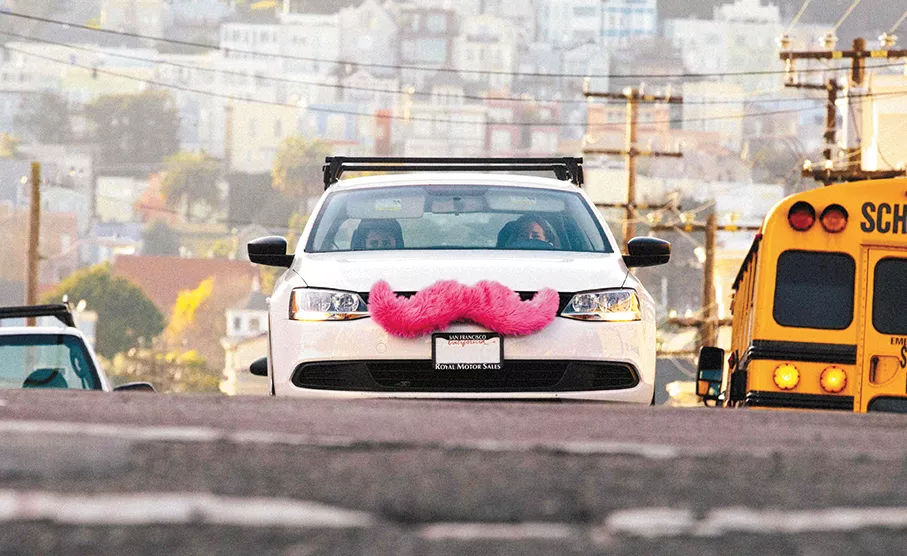 Giant fuzzy pink mustaches are an iconic part of the Lyft ridesharing brand — but they've made it simple for local cab drivers to report Lyft drivers.