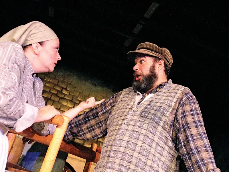 Golde (Renei Yarrow), left, and Tevye (Steve Kane) argue in Fiddler. - YOUNG KWAK