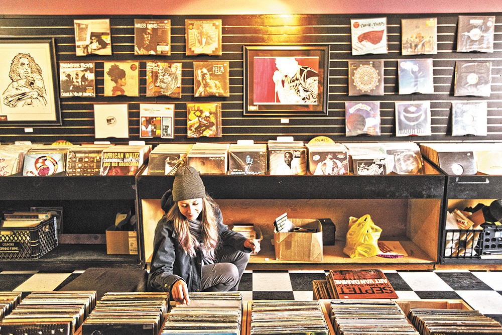 Groove Merchants customer Laura Provance browses for records - YOUNG KWAK