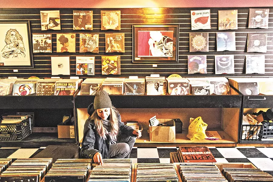Groove Merchants customer Laura Provance browses for records - YOUNG KWAK