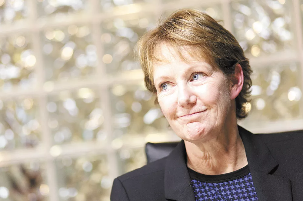 Jan Quintrall, Spokane's embattled division director of Business and Development services, resigned after criticisms of her fine dining at an upscale club. - YOUNG KWAK