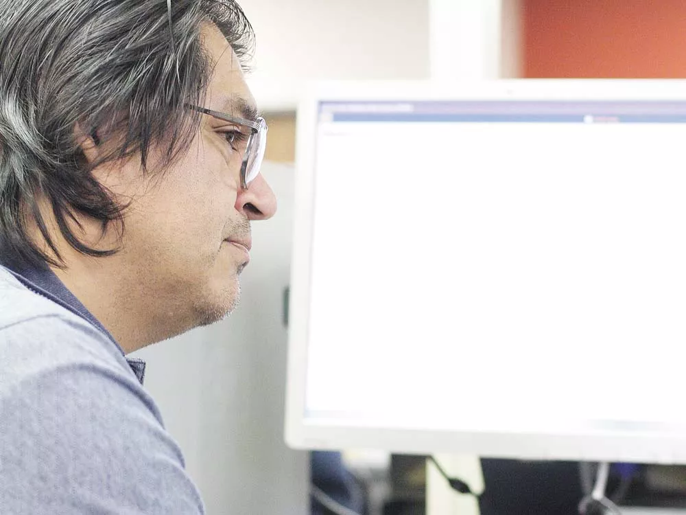 Joe Ortiz, 46, hasn't had a full-time job since August 2008. Last week he was at WorkSource, trying to find work. - YOUNG KWAK