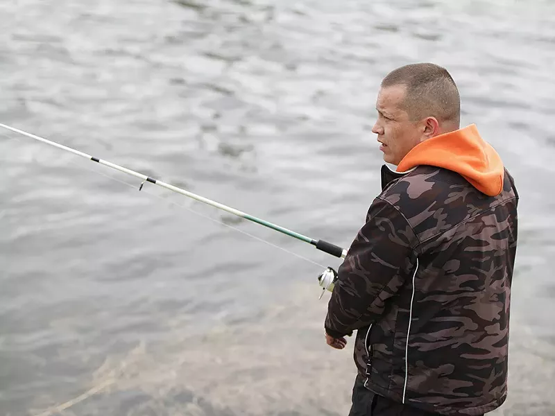 Kalispel tribal vice-chair Ray Pierre fishes along the Pend Oreille River near Cusick, Wash. - YOUNG KWAK