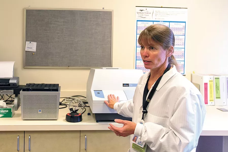 Karie Brouillard is the lead microbiologist at the Spokane Regional Health District's bioterrorism lab. - MATT WEIGAND