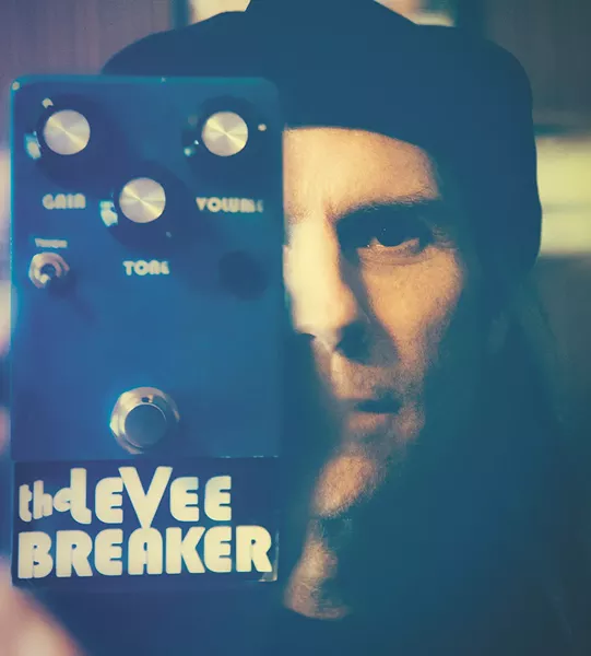 Kit Ehrgood shows off a prototype for a new guitar pedal he’s developing. - KRISTEN BLACK