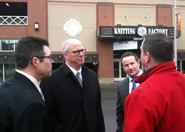Knitting Factory COO Greg Marchant, center, and other company representatives chat with the media. - LISA WAANANEN