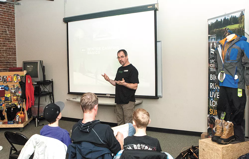 Kurt Perrigo discusses preparing for a winter camping trip during a class at the Spokane REI. - MEGHAN KIRK