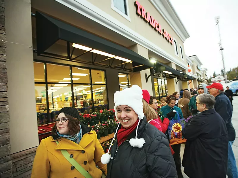 Lining up for savings at the New Trader Joe's - YOUNG KWAK