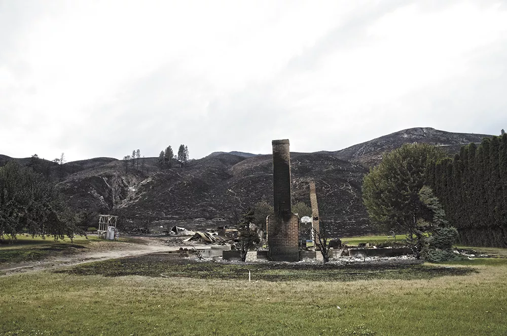 Little remains of the McGaha home along Old Highway 97 after the Carlton Complex Fire swept through earlier this month. - JACOB JONES
