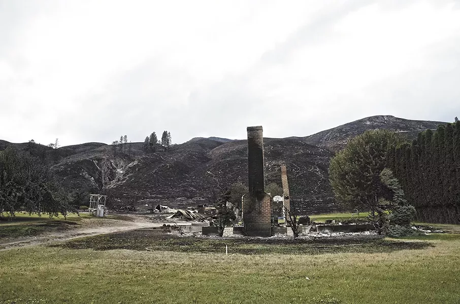 Little remains of the McGaha home along Old Highway 97 after the Carlton Complex Fire swept through earlier this month. - JACOB JONES