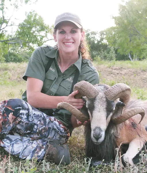 Lowrey with a corsican ram she took down in Texas this summer.