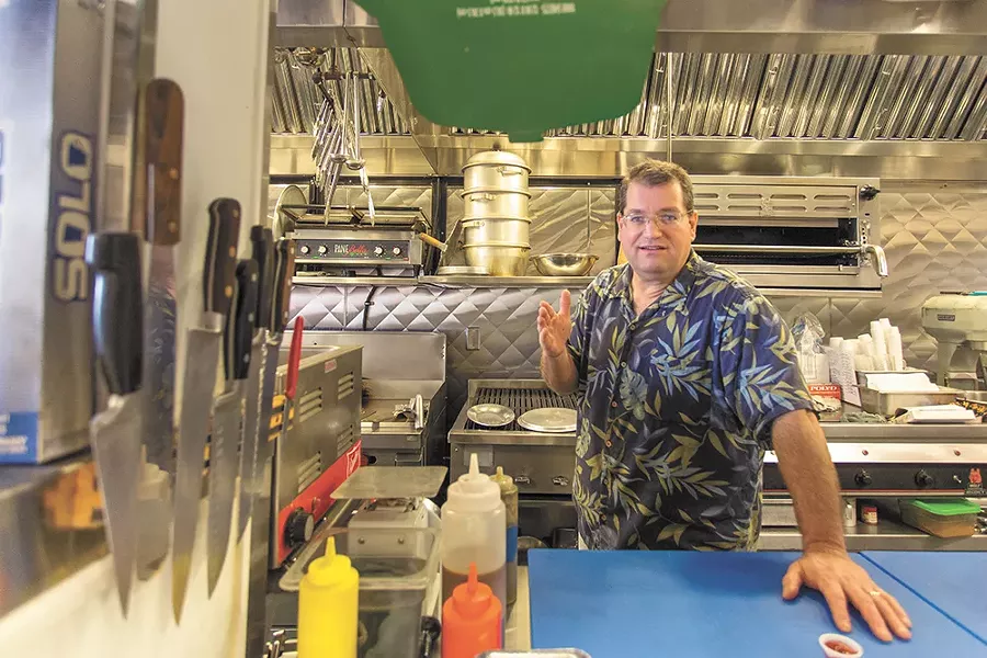 Marina's owner Aaron Steinberg in the north Spokane restaurant's kitchen. - MATT WEIGAND