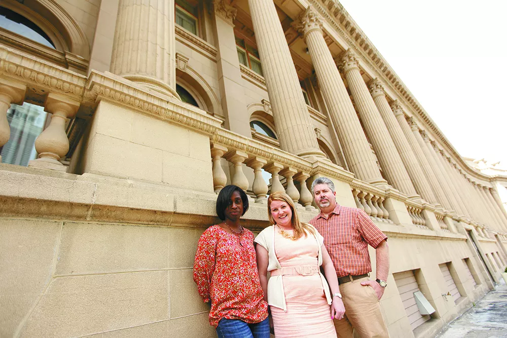 Masonic Center co-owner Luisita Francis Newell (left), events manager Kimberley Scott (center) and project manager Matt Ragan in front of the century-old building. - YOUNG KWAK