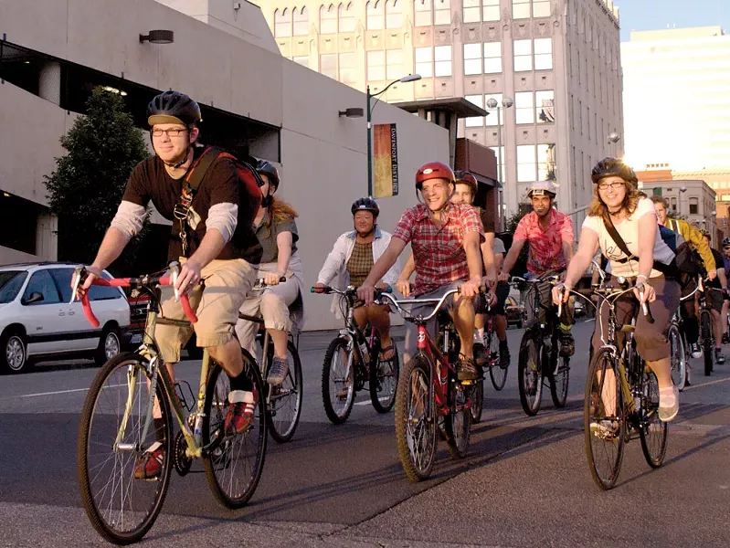 Members of the F---ing Bike Club ride through downtown Spokane - YOUNG KWAK