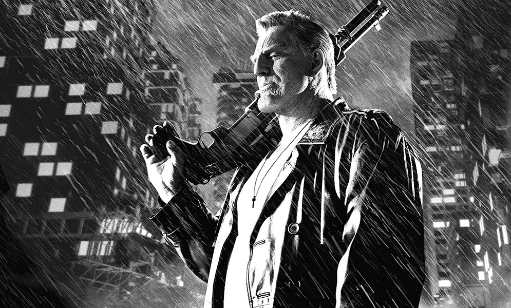 Mickey Rourke goes heavy on the makeup for his second trip to Sin City.