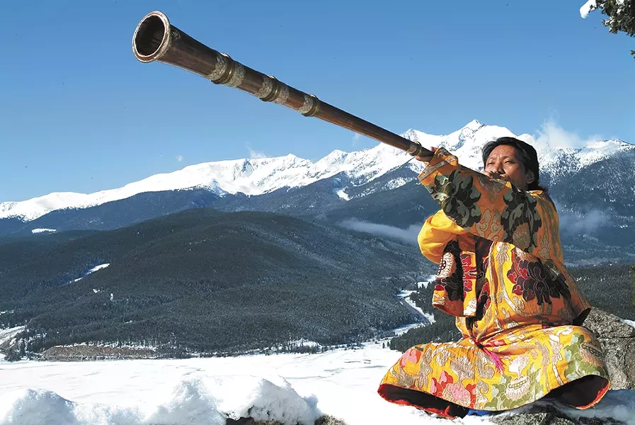 Nawang Khechog at peace in the mountains.