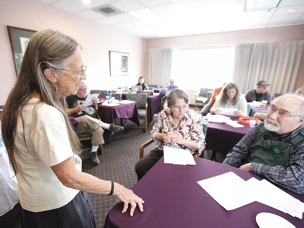 Outreach Coordinator Jody Grage, left, speaks with Morton Alexander, at last weekend\'s Green Party gathering. - YOUNG KWAK